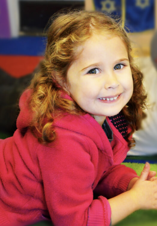 Smiling girl at daycare