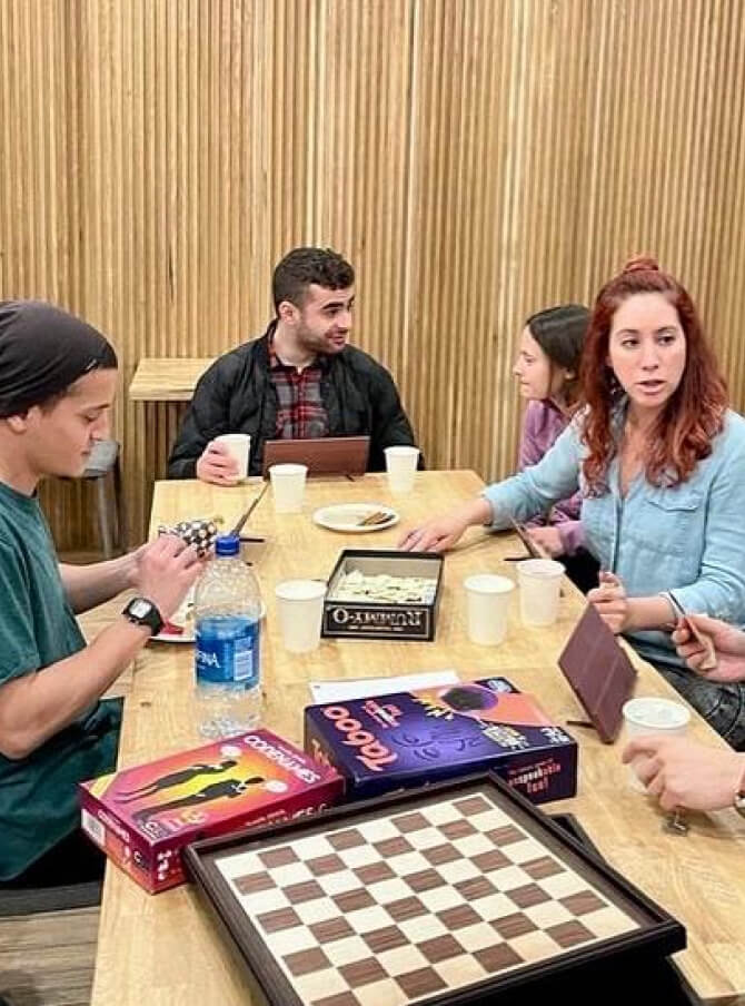 adults playing board games